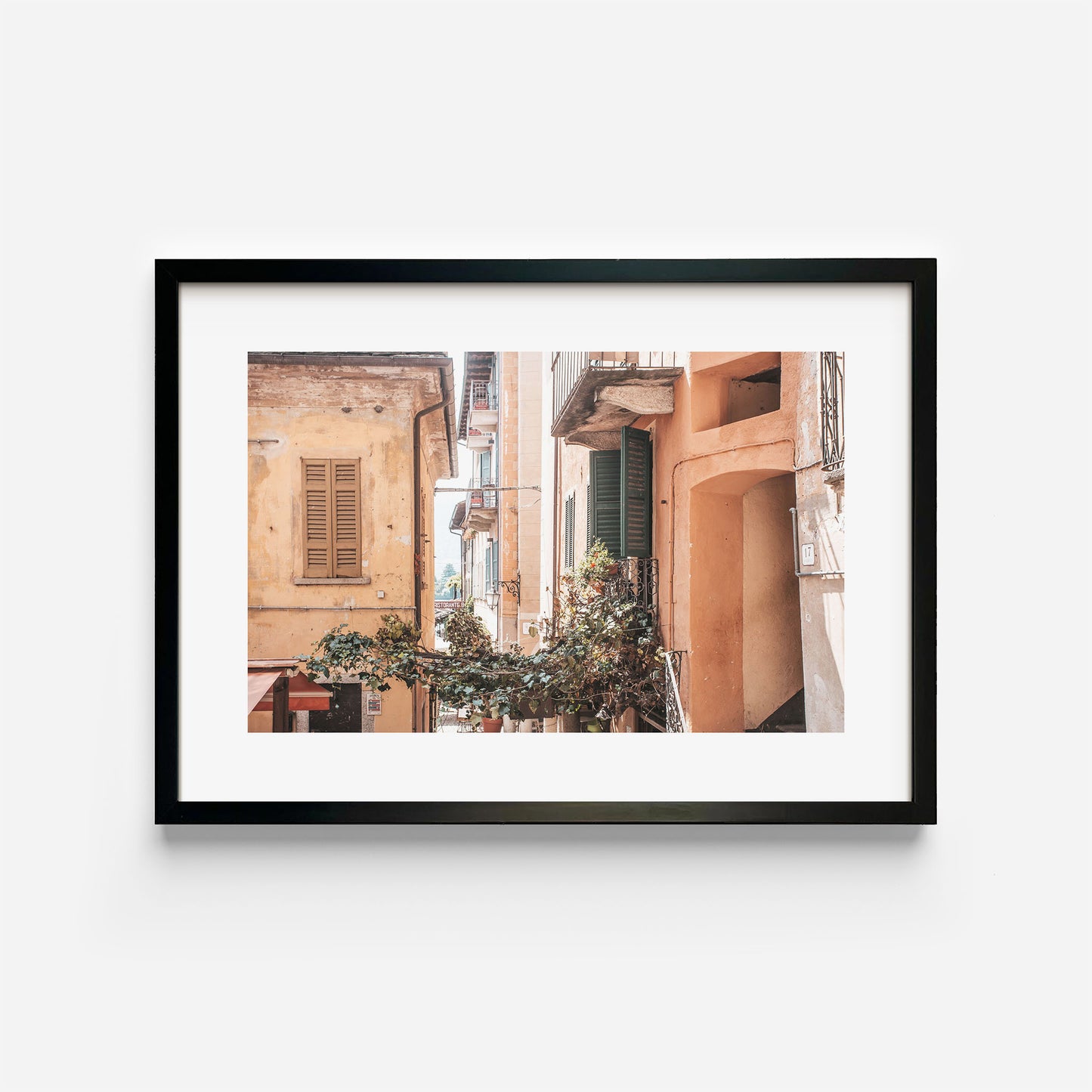 Cobblestone Streets of Orta San Guilio Art Print Black Frame